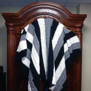 Hand crocheted super soft blanket.